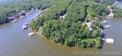 FANTASTIC VIEW OF *THE LAKE* .......PREMIUM LOT.......COVE on The Club At Porto Cima in Missouri - for sale on GolfHomes.com, golf home, golf lot