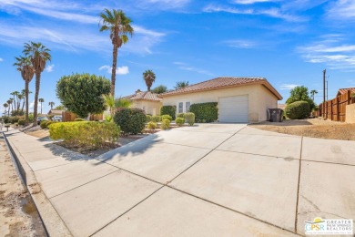 Introducing a custom-built (2002) desert retreat set on a on Bermuda Dunes Country Club in California - for sale on GolfHomes.com, golf home, golf lot