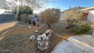 Cozy & Spacious Sun City Ranier Model.  A favorable Home on Sun City Lakes West and East in Arizona - for sale on GolfHomes.com, golf home, golf lot
