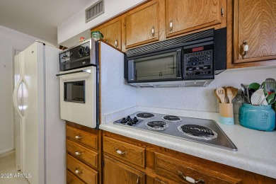 Welcoming  Spacious Sun City Rainier Model - Ideal for Active on Sun City Lakes West and East in Arizona - for sale on GolfHomes.com, golf home, golf lot