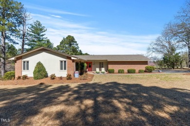 This charming 3-bedroom, 2-bathroom home is situated on a on Quail Ridge Golf Course in North Carolina - for sale on GolfHomes.com, golf home, golf lot