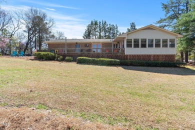 This charming 3-bedroom, 2-bathroom home is situated on a on Quail Ridge Golf Course in North Carolina - for sale on GolfHomes.com, golf home, golf lot