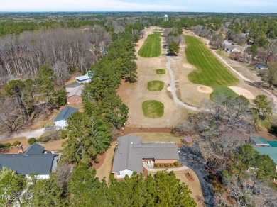 This charming 3-bedroom, 2-bathroom home is situated on a on Quail Ridge Golf Course in North Carolina - for sale on GolfHomes.com, golf home, golf lot