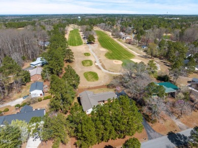 This charming 3-bedroom, 2-bathroom home is situated on a on Quail Ridge Golf Course in North Carolina - for sale on GolfHomes.com, golf home, golf lot