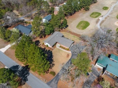This charming 3-bedroom, 2-bathroom home is situated on a on Quail Ridge Golf Course in North Carolina - for sale on GolfHomes.com, golf home, golf lot