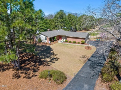 This charming 3-bedroom, 2-bathroom home is situated on a on Quail Ridge Golf Course in North Carolina - for sale on GolfHomes.com, golf home, golf lot