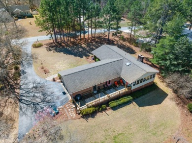 This charming 3-bedroom, 2-bathroom home is situated on a on Quail Ridge Golf Course in North Carolina - for sale on GolfHomes.com, golf home, golf lot