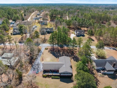 This charming 3-bedroom, 2-bathroom home is situated on a on Quail Ridge Golf Course in North Carolina - for sale on GolfHomes.com, golf home, golf lot