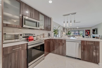 ABSOLUTELY STUNNING GROUND FLOOR CORNER UNIT! GORGEOUS BOTH on Boca Lago Golf and Country Club in Florida - for sale on GolfHomes.com, golf home, golf lot