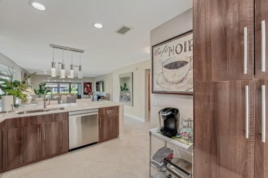 ABSOLUTELY STUNNING GROUND FLOOR CORNER UNIT! GORGEOUS BOTH on Boca Lago Golf and Country Club in Florida - for sale on GolfHomes.com, golf home, golf lot
