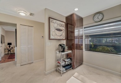 ABSOLUTELY STUNNING GROUND FLOOR CORNER UNIT! GORGEOUS BOTH on Boca Lago Golf and Country Club in Florida - for sale on GolfHomes.com, golf home, golf lot