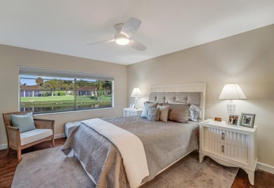 ABSOLUTELY STUNNING GROUND FLOOR CORNER UNIT! GORGEOUS BOTH on Boca Lago Golf and Country Club in Florida - for sale on GolfHomes.com, golf home, golf lot