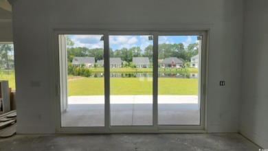 Welcome to this beautifully crafted custom home in the on Wild Wing Plantation in South Carolina - for sale on GolfHomes.com, golf home, golf lot