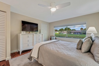 ABSOLUTELY STUNNING GROUND FLOOR CORNER UNIT! GORGEOUS BOTH on Boca Lago Golf and Country Club in Florida - for sale on GolfHomes.com, golf home, golf lot