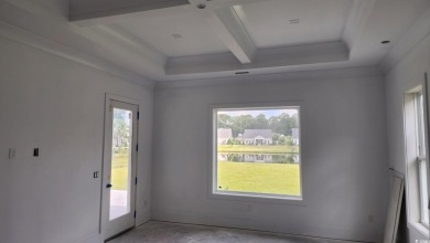 Welcome to this beautifully crafted custom home in the on Wild Wing Plantation in South Carolina - for sale on GolfHomes.com, golf home, golf lot