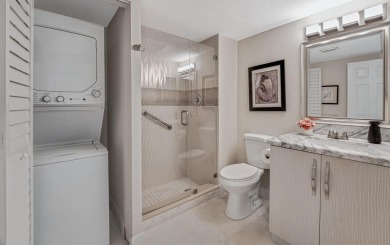 ABSOLUTELY STUNNING GROUND FLOOR CORNER UNIT! GORGEOUS BOTH on Boca Lago Golf and Country Club in Florida - for sale on GolfHomes.com, golf home, golf lot