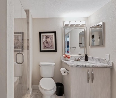 ABSOLUTELY STUNNING GROUND FLOOR CORNER UNIT! GORGEOUS BOTH on Boca Lago Golf and Country Club in Florida - for sale on GolfHomes.com, golf home, golf lot