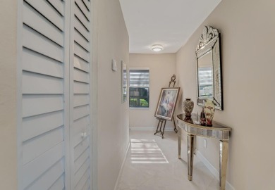 ABSOLUTELY STUNNING GROUND FLOOR CORNER UNIT! GORGEOUS BOTH on Boca Lago Golf and Country Club in Florida - for sale on GolfHomes.com, golf home, golf lot