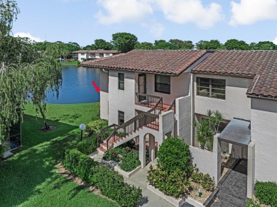 ABSOLUTELY STUNNING GROUND FLOOR CORNER UNIT! GORGEOUS BOTH on Boca Lago Golf and Country Club in Florida - for sale on GolfHomes.com, golf home, golf lot