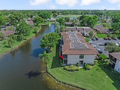 ABSOLUTELY STUNNING GROUND FLOOR CORNER UNIT! GORGEOUS BOTH on Boca Lago Golf and Country Club in Florida - for sale on GolfHomes.com, golf home, golf lot