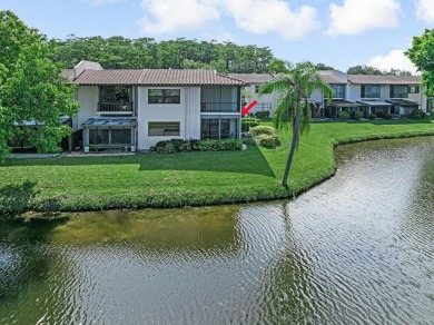 ABSOLUTELY STUNNING GROUND FLOOR CORNER UNIT! GORGEOUS BOTH on Boca Lago Golf and Country Club in Florida - for sale on GolfHomes.com, golf home, golf lot
