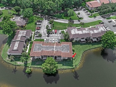 ABSOLUTELY STUNNING GROUND FLOOR CORNER UNIT! GORGEOUS BOTH on Boca Lago Golf and Country Club in Florida - for sale on GolfHomes.com, golf home, golf lot