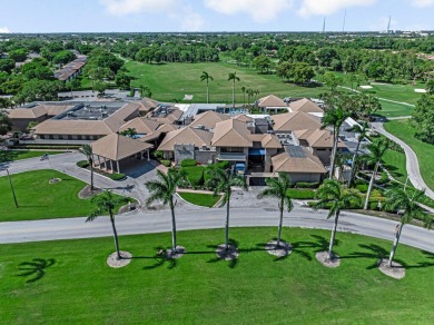 ABSOLUTELY STUNNING GROUND FLOOR CORNER UNIT! GORGEOUS BOTH on Boca Lago Golf and Country Club in Florida - for sale on GolfHomes.com, golf home, golf lot