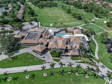 ABSOLUTELY STUNNING GROUND FLOOR CORNER UNIT! GORGEOUS BOTH on Boca Lago Golf and Country Club in Florida - for sale on GolfHomes.com, golf home, golf lot
