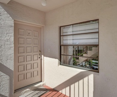 ABSOLUTELY STUNNING GROUND FLOOR CORNER UNIT! GORGEOUS BOTH on Boca Lago Golf and Country Club in Florida - for sale on GolfHomes.com, golf home, golf lot