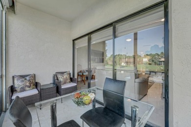 ABSOLUTELY STUNNING GROUND FLOOR CORNER UNIT! GORGEOUS BOTH on Boca Lago Golf and Country Club in Florida - for sale on GolfHomes.com, golf home, golf lot