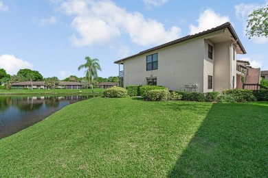 ABSOLUTELY STUNNING GROUND FLOOR CORNER UNIT! GORGEOUS BOTH on Boca Lago Golf and Country Club in Florida - for sale on GolfHomes.com, golf home, golf lot