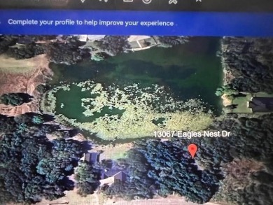 HEAVILY WOODED LOT BACKS UP TO NICE POND IN BEAUTIFUL WHITE on White Bluff Resort - Old Course in Texas - for sale on GolfHomes.com, golf home, golf lot