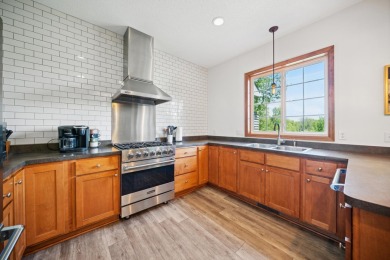 Set in a private, tree-lined location with a tranquil pond out on Golf at the Legacy in Minnesota - for sale on GolfHomes.com, golf home, golf lot