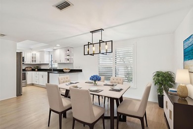 One or more photo(s) has been virtually staged. Beautifully on Feather Sound Country Club in Florida - for sale on GolfHomes.com, golf home, golf lot