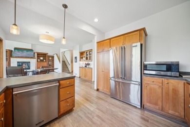 Set in a private, tree-lined location with a tranquil pond out on Golf at the Legacy in Minnesota - for sale on GolfHomes.com, golf home, golf lot