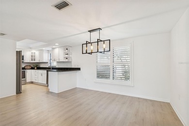 One or more photo(s) has been virtually staged. Beautifully on Feather Sound Country Club in Florida - for sale on GolfHomes.com, golf home, golf lot