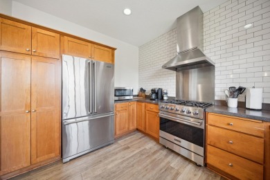 Set in a private, tree-lined location with a tranquil pond out on Golf at the Legacy in Minnesota - for sale on GolfHomes.com, golf home, golf lot