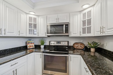 One or more photo(s) has been virtually staged. Beautifully on Feather Sound Country Club in Florida - for sale on GolfHomes.com, golf home, golf lot