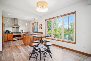Set in a private, tree-lined location with a tranquil pond out on Golf at the Legacy in Minnesota - for sale on GolfHomes.com, golf home, golf lot