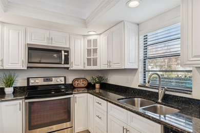 One or more photo(s) has been virtually staged. Beautifully on Feather Sound Country Club in Florida - for sale on GolfHomes.com, golf home, golf lot