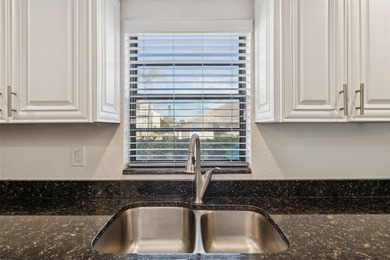 One or more photo(s) has been virtually staged. Beautifully on Feather Sound Country Club in Florida - for sale on GolfHomes.com, golf home, golf lot