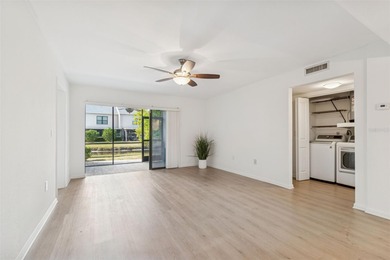 One or more photo(s) has been virtually staged. Beautifully on Feather Sound Country Club in Florida - for sale on GolfHomes.com, golf home, golf lot