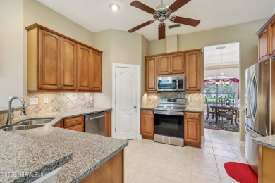 Beautiful 4BR/2.5BA Eagle Harbor golf course home with serene on Eagle Harbor Golf Club in Florida - for sale on GolfHomes.com, golf home, golf lot