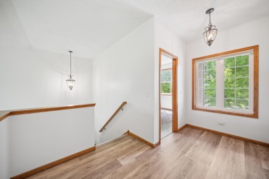 Set in a private, tree-lined location with a tranquil pond out on Golf at the Legacy in Minnesota - for sale on GolfHomes.com, golf home, golf lot