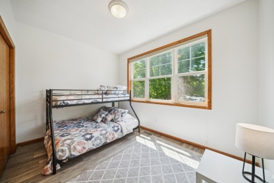 Set in a private, tree-lined location with a tranquil pond out on Golf at the Legacy in Minnesota - for sale on GolfHomes.com, golf home, golf lot