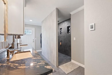 Fully remodeled, all-electric home offering nearly 5,000 sq ft on The Course at River Oaks in Arkansas - for sale on GolfHomes.com, golf home, golf lot