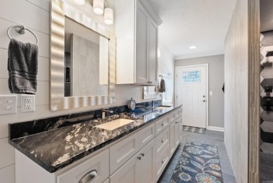 Fully remodeled, all-electric home offering nearly 5,000 sq ft on The Course at River Oaks in Arkansas - for sale on GolfHomes.com, golf home, golf lot