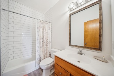 Set in a private, tree-lined location with a tranquil pond out on Golf at the Legacy in Minnesota - for sale on GolfHomes.com, golf home, golf lot