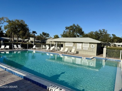 3 Bedrooms, 2 1/2 baths condo in a Private 24 hour roving on Spruce Creek Golf Club in Florida - for sale on GolfHomes.com, golf home, golf lot