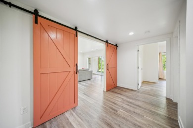 Set in a private, tree-lined location with a tranquil pond out on Golf at the Legacy in Minnesota - for sale on GolfHomes.com, golf home, golf lot